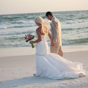 bride walking on the beach